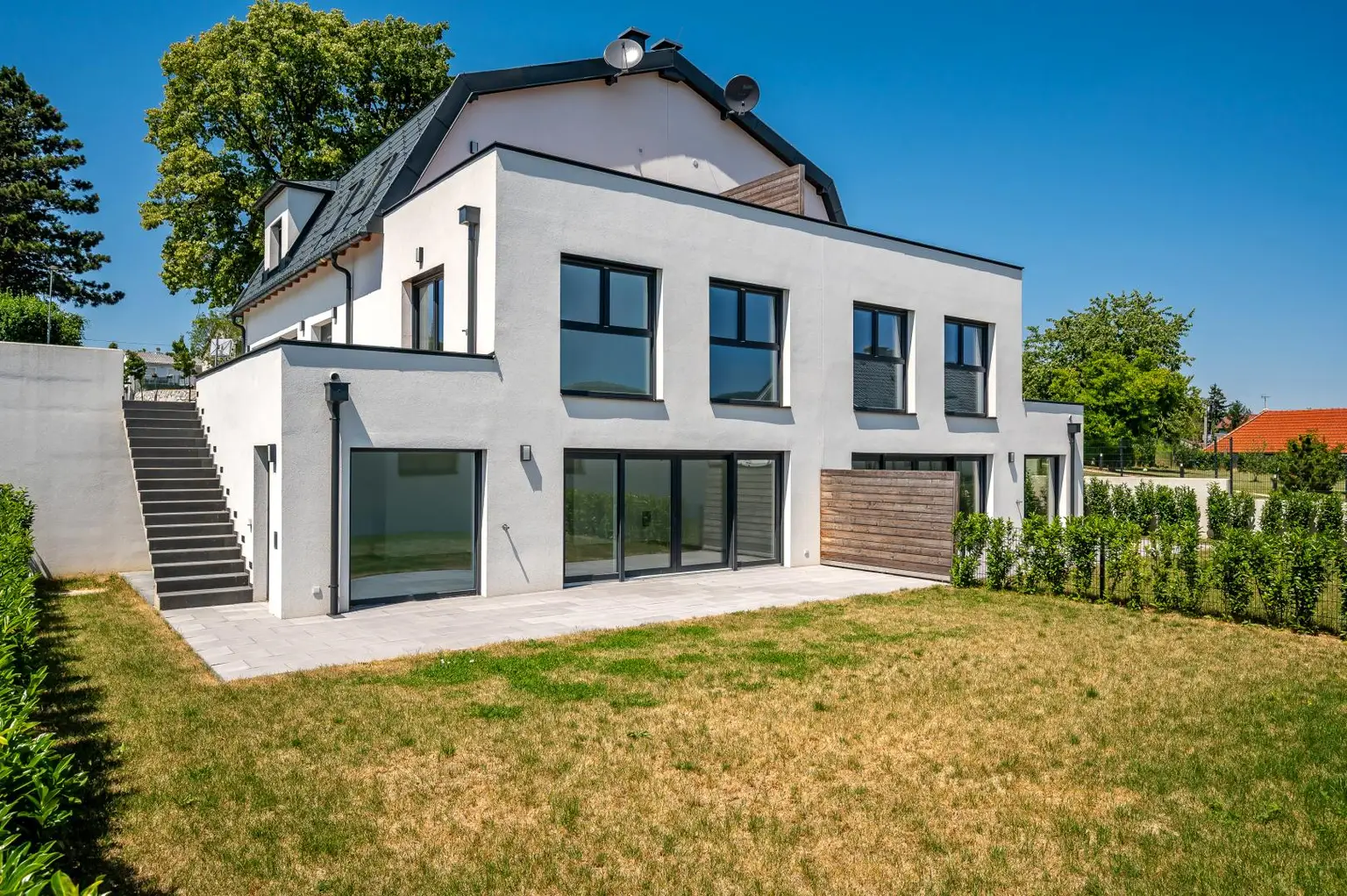 Erstbezug: Großzügiger Familientraum mit unverbaubarem Grünblick!