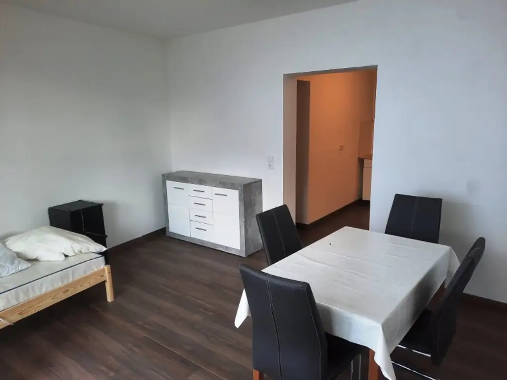 Anlegerpaket in Baden: 2 Wohnungen, 2 Stadthäuser und 4 Stellplätze