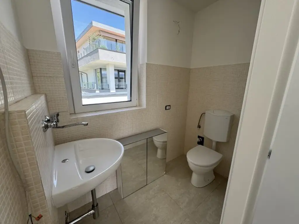 2-ZIMMER-WOHNUNG MIT PENTHOUSE-CHARAKTER IN PÖRTSCHACH AM WÖRTHERSEE – ERSTBEZUG